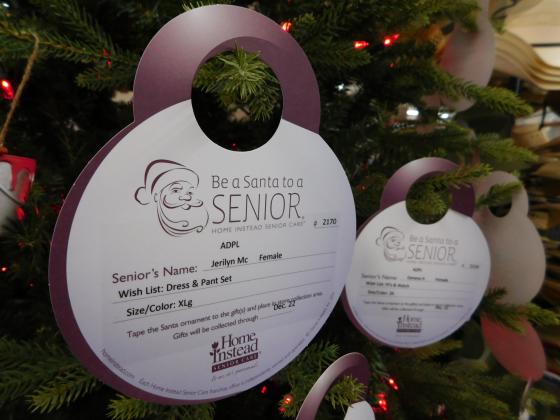A photo of two ornaments which are used to mark gifts to be given to senior citizens