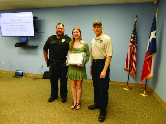 Nederland Police Department Officer Jeremy Reese, Madelyn Reese, and Chief Gary Porter 