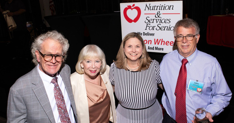 Cindy and Michael Lindsay, along with Laurie and John Mathews, gather at the 13th annual Deliver the Difference Luncheon. This event, benefiting Meals on Wheels, honored their commitment to supporting Nutrition & Services for Seniors and recognizes their ongoing contributions to the community. 