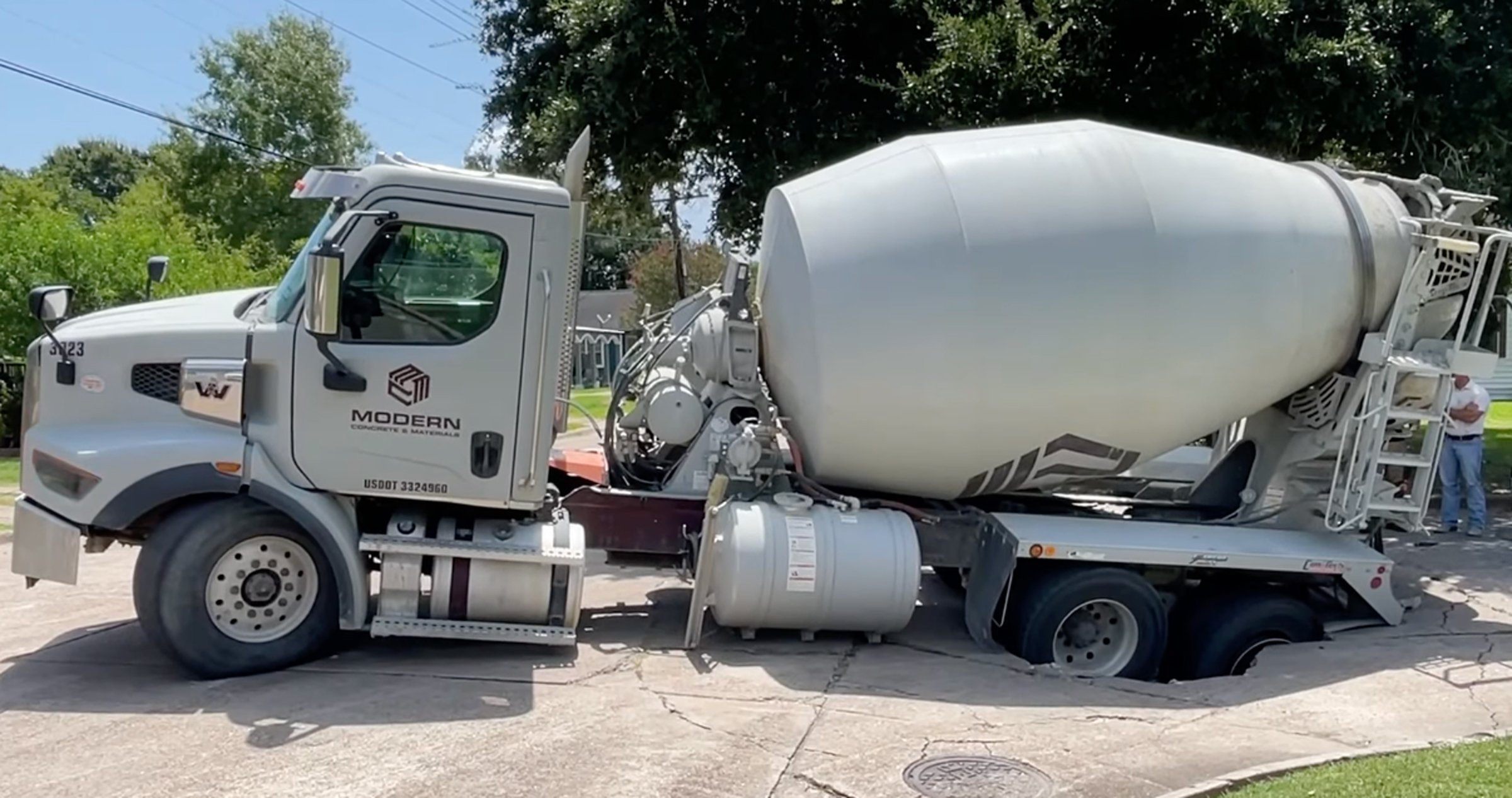 Port Arthur street gave way taking down Modern concrete truck