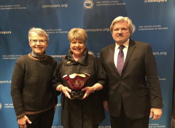 Mayor Becky Ames poses with her award.