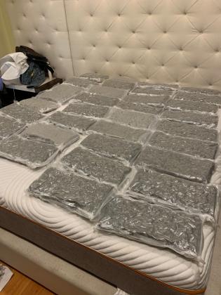 Officers in PA recovered 50 lbs of marijuana and multiple guns in a narcotics search Jan. 16.