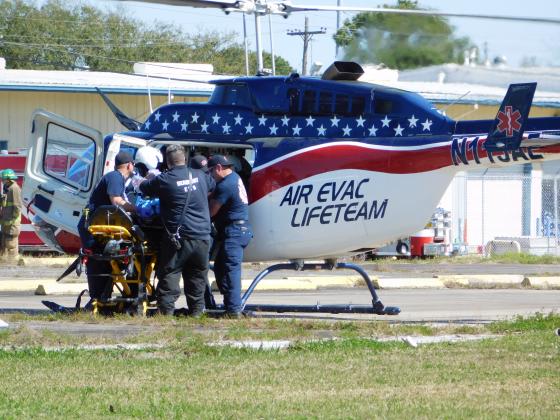 Loading victim into helicopter