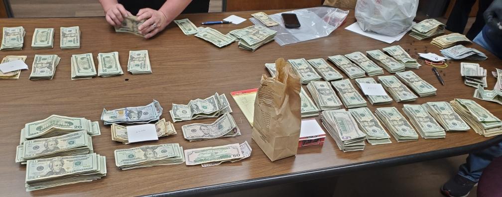 Cash and drugs found.