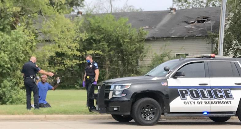 BPD officers respond to a man seen "fighting" cars as they passed him on MLK