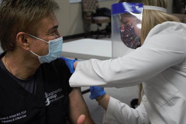 Dr. Qamar Arfeen was among the first physicians in Southeast Texas to be vaccinated 