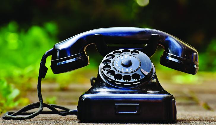 A black rotary phone.