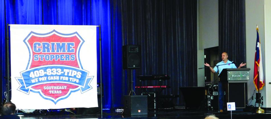 Campus Crime Stoppers Director Jeremy Raley addresses the crowd at the Beaumont Event Centre.