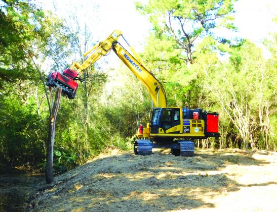 A stump grinder used to clear trees for DD6.