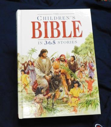 A children's bible given out at Bicycles and Bibles
