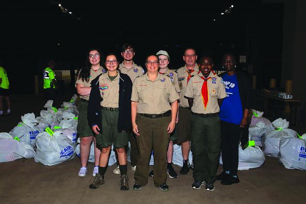 A group of volunteers poses at Bicycles and Bibles