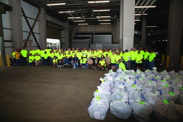 More than 300 volunteers assembled to bring Christmas cheer to 1,000 Southeast Texas children.