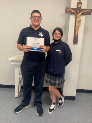 St. Mary Catholic School 2021-2022 Spelling Bee Champion Jonathan Quintero (left) and runner up Allie Broussard.