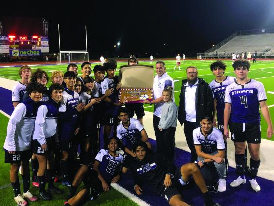 PN-G soccer coach Chad Luttrull celebrates his 300th career win