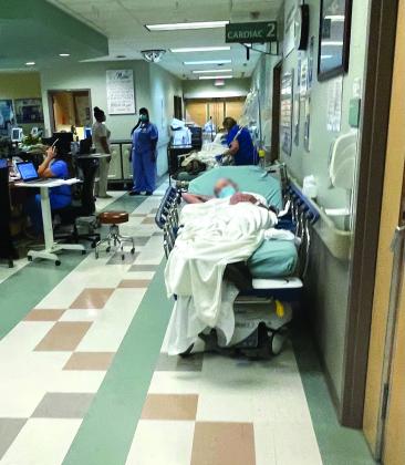 Patients are treated in makeshift rooms at Baptist Hospital of Southeast Texas in September 2021.