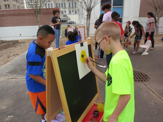 Children painting at Family Arts Day