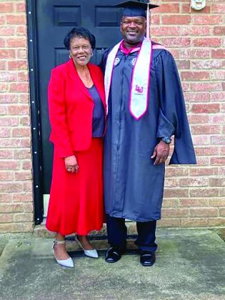 Evans poses with his mother, Betty Evans, after earning a Master's of Public Health from Lamar in 2021