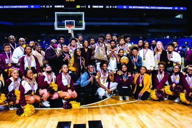 A group photo of all of the players and coaches of the Beaumont United Timberwolves
