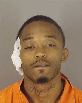 A 2015 mugshot of Brandon Jamal Miller, 32