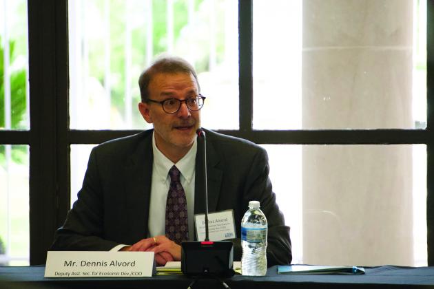Assistant Secretary Dennis Alford asks questions about the :SCPA-led proposal during a visit to Port Arthur April 22 