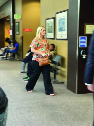 Bond moves past a courtroom admonishment for appropriate courtroom attire