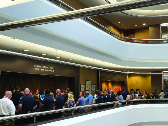 Lined up outside the courtroom before 9 a.m. May 23 are dozens of family members, friends and coworkers of both Torres and Yarbrough-Powell.