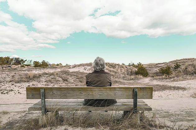 Woman sitting on a bench 