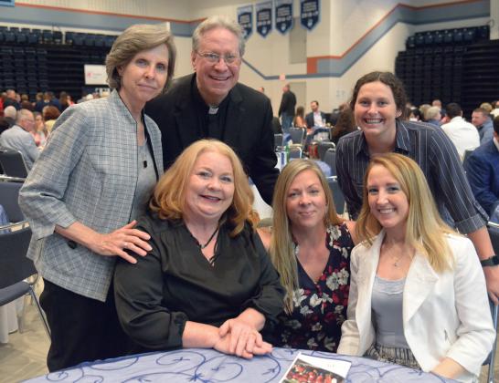 Michelle Falgout, Carol Gary, Father Kevin Badeaux, Jessica Pederson, Jenna Fuller and Maureen Schneider