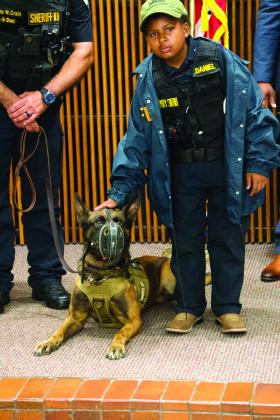 DJ Daniel poses with JCSO K-9, Duke
