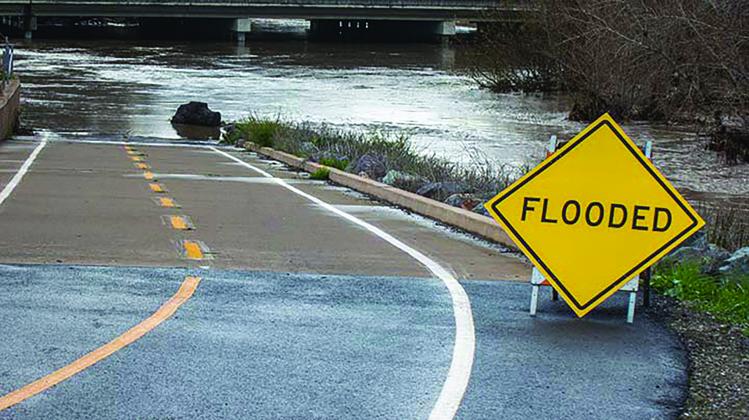 A sign warning against flooding