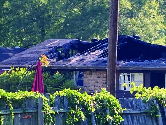 Damaged home photo by Dannie Oliveaux