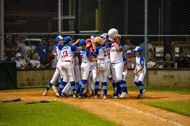 West End Little League 12yos celebrate after taking the win over Bridge City (Photo by Chad Cooper)