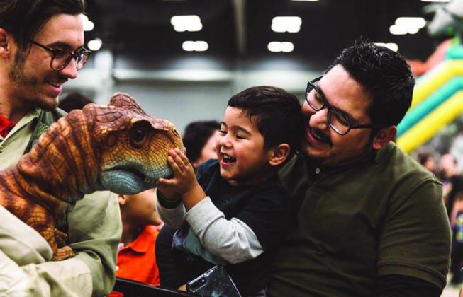 Dinosaurs interacting with kids