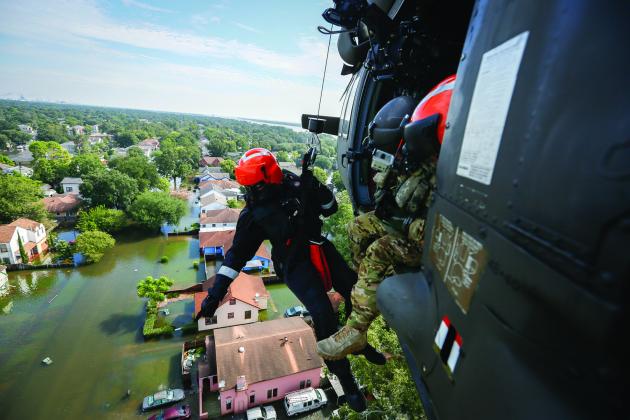 Photo from Hurricane Harvey of the National Guard making rescue 