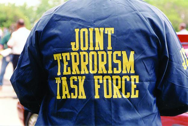 Someone wearing a Joint Terrorism Task Force