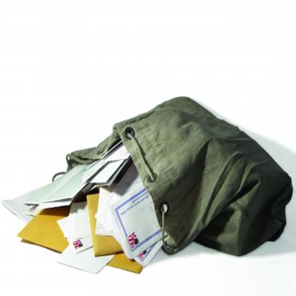 Mailbag with mail spilling out 