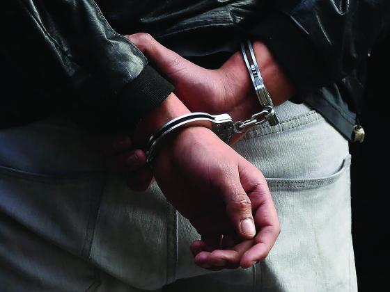 Person in handcuffs 
