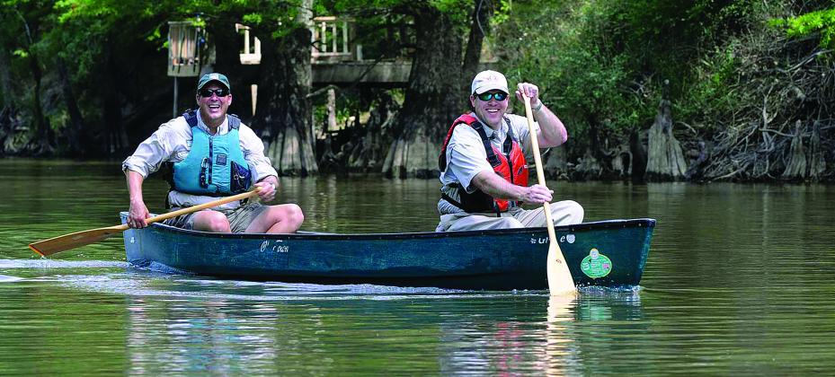 Two men paddling at Village Creek State Park 
