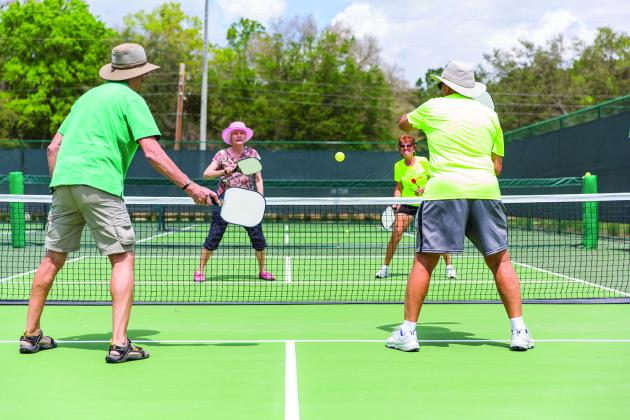 People playing Pickleball 