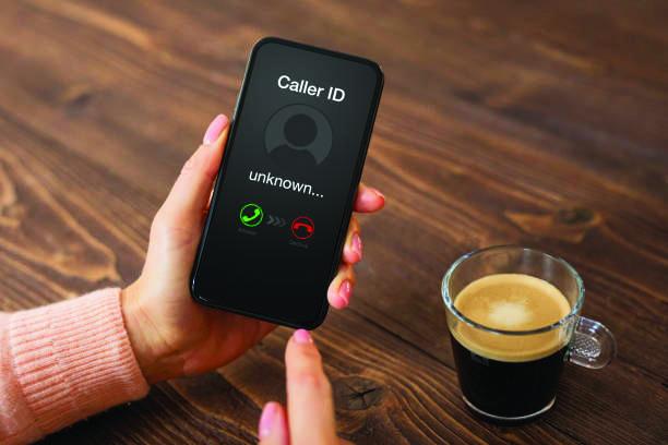 A person receiving an unknown cell phone call