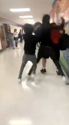 A West Brook student is jumped by two others in 2021.