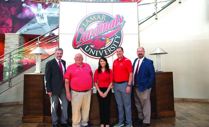 Dr. Jaime Taylor, Don Shaver (1976) and Nga Tea Do (2008), Jeff O’Malley and Dr. Dann Brown (LU Provost and Vice President)