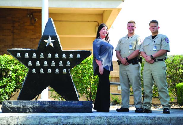 Holly Hebert (sister of Officer Bryan Hebert), and Cadets Michael Maldonado and Adam Good.