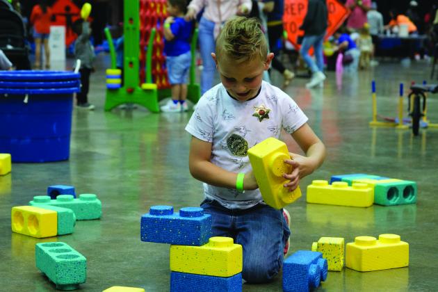 Boy playing with giant legos at the Beaumont Children's Museum