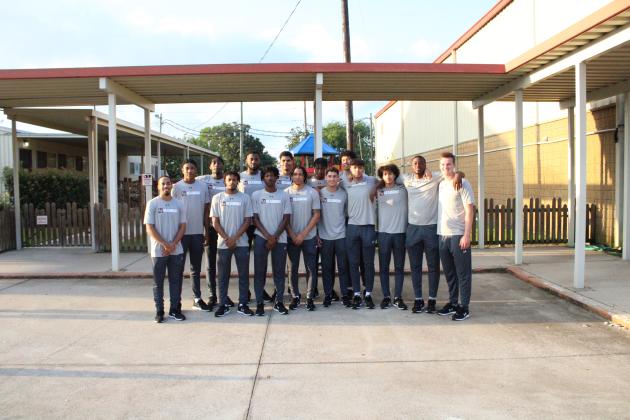 LU men’s basketball team volunteers to help the Kids Around the World organization.