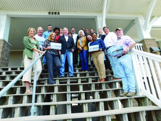 The artificial reef group poses outside