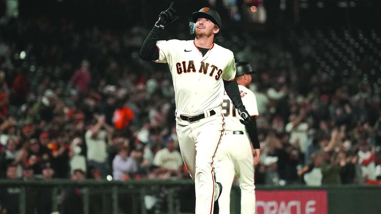 Proctor celebrates after hitting a grand slam (photo from SFGiants.com)