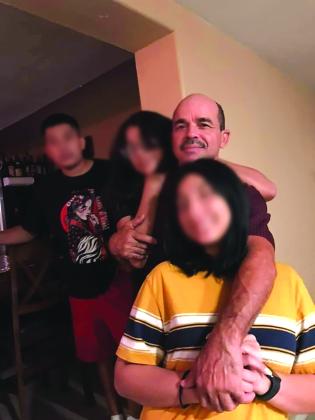 2021 posted photo of Albelo with family members