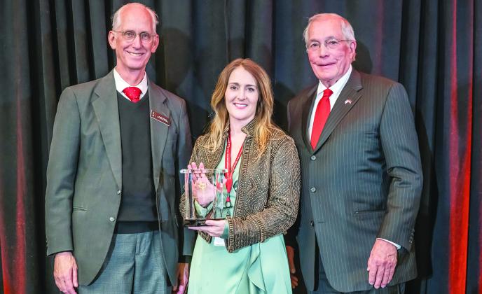 THC Executive Director Mark Wolfe, KVLU Development Director Shannon Harris and THC Chairman John L. Nau, III