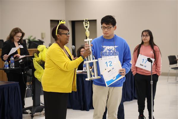Beaumont ISD Odom Academy Middle School eighth-grader Aiden Ma (right) won the 2023 Zone 4 Regional Spelling Bee.